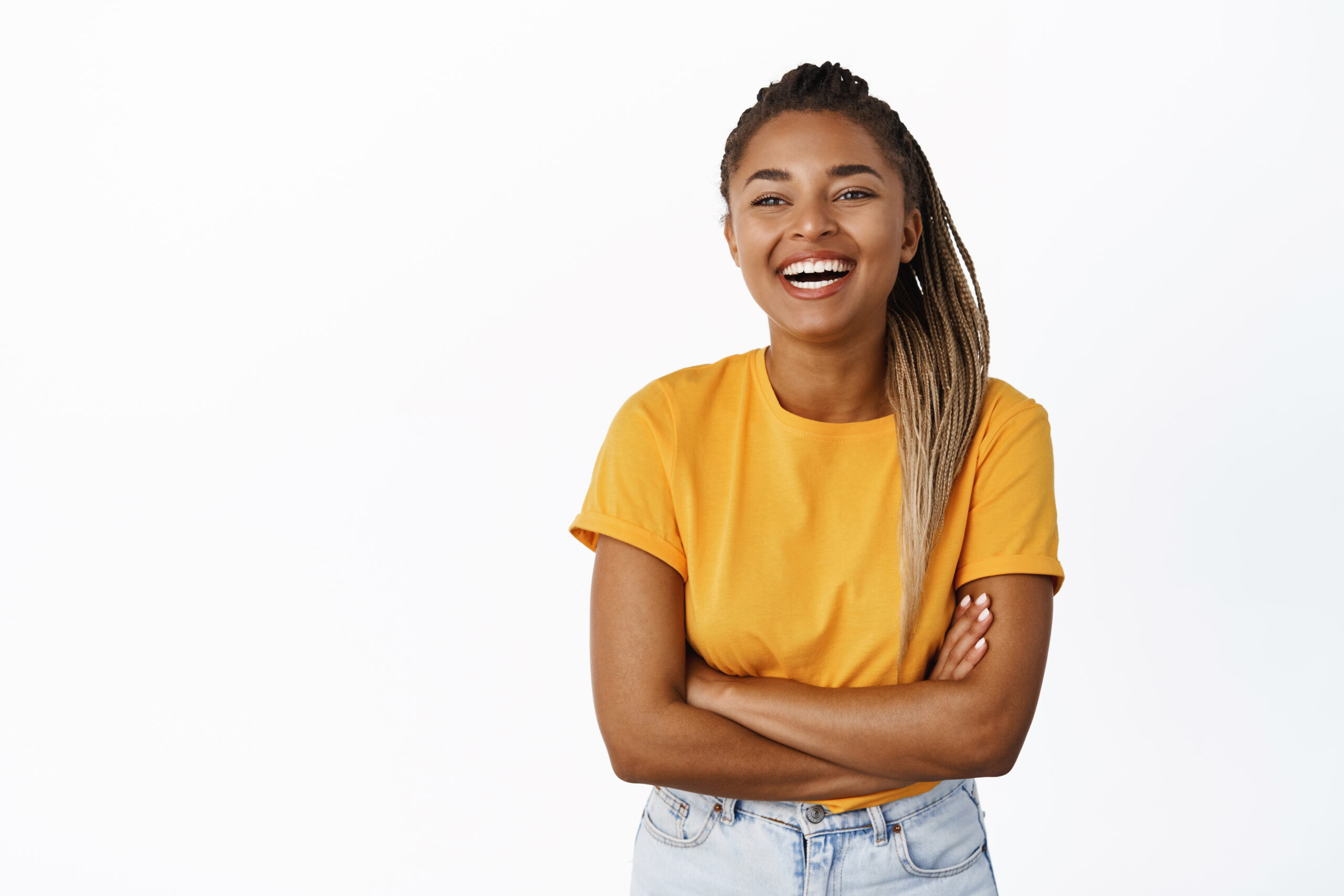 Happiness and people. Laughing Black woman smiling and looking carefree, joyful chuckle over smth funny, standing over white background.